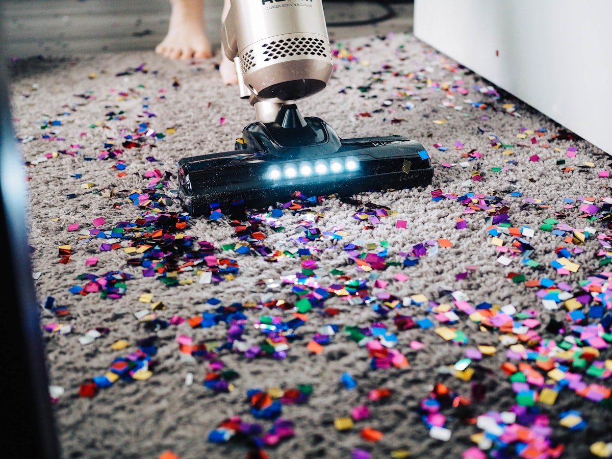 Carpet being vacuumed clean