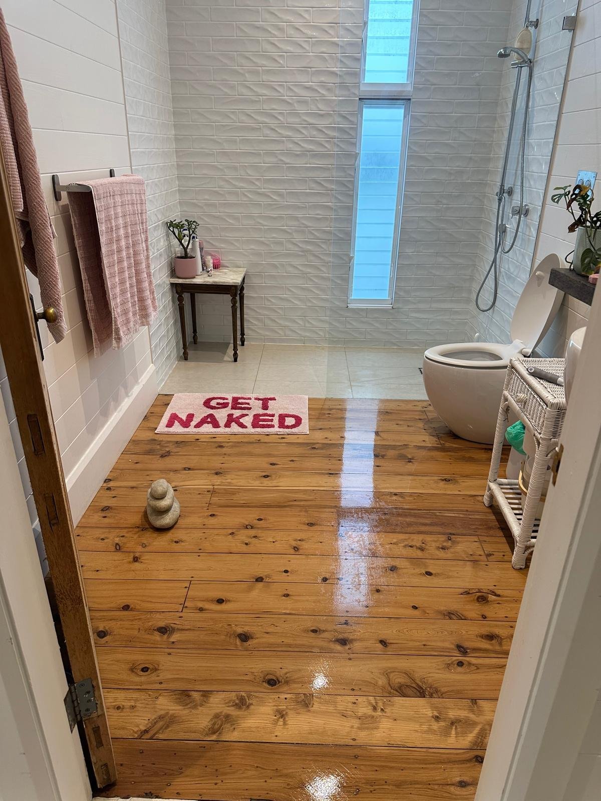 Freshly deep-cleaned bathroom with gleaming floors